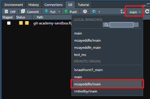 The Git panel in RStudio with red rectangles highlighting the branches drop down menu and an example of a user branch that we want to switch to.